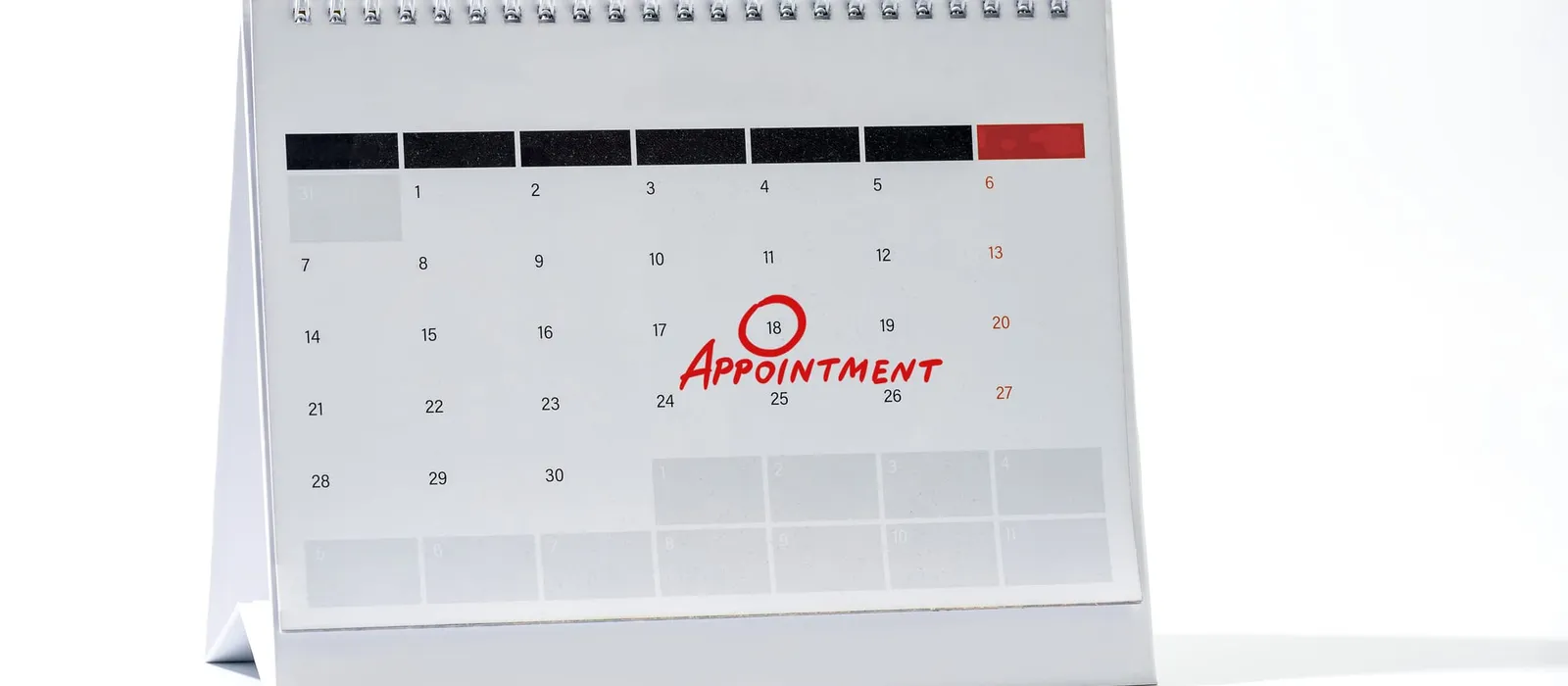 Red circle marked on a desk calendar