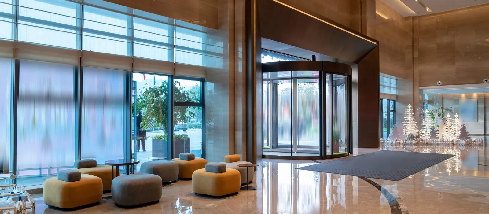 Lobby of a modern hotel with seating and reception