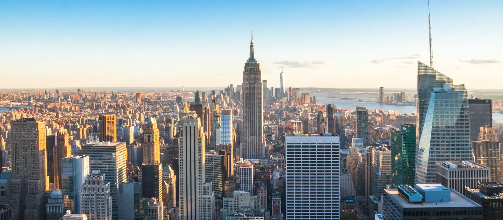 Downtown Manhattan skyscrapers at sunset