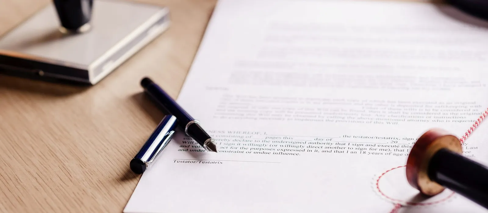 Notary pen lying on a testament