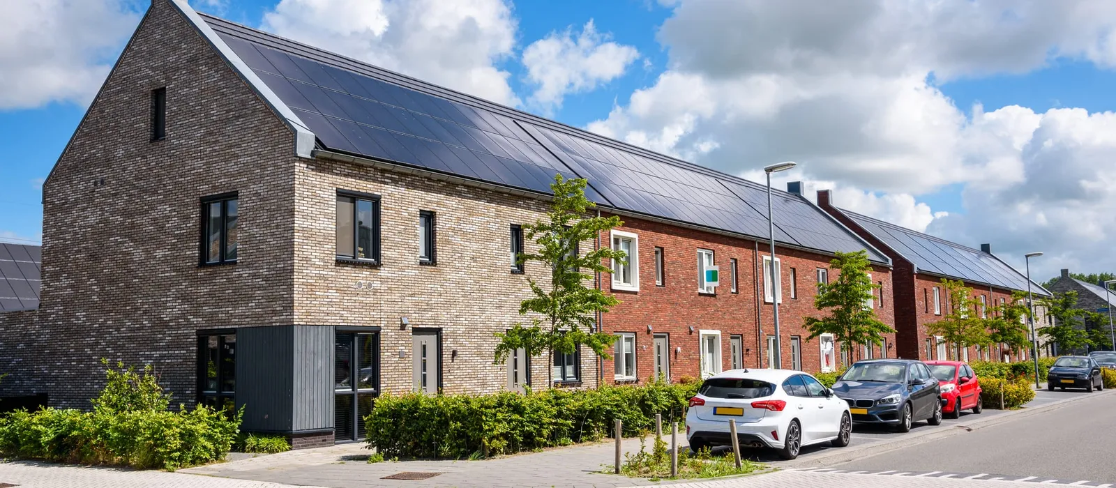 Row houses with rooftop solar panels in a new housing development