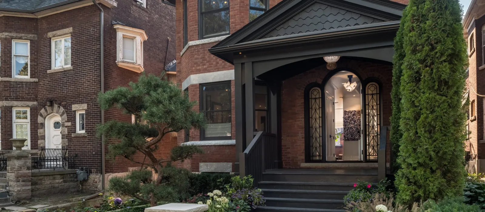 Urban home exterior at dusk