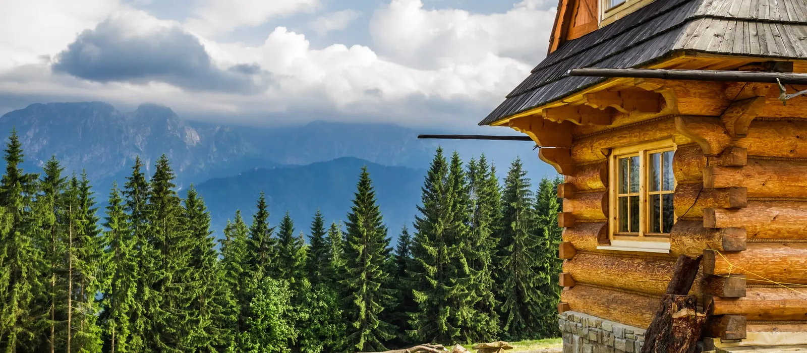 Wood cottage with forest and mountain views