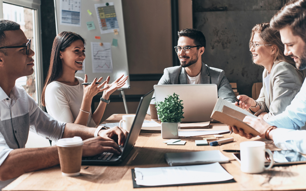 Young People At Business Meeting