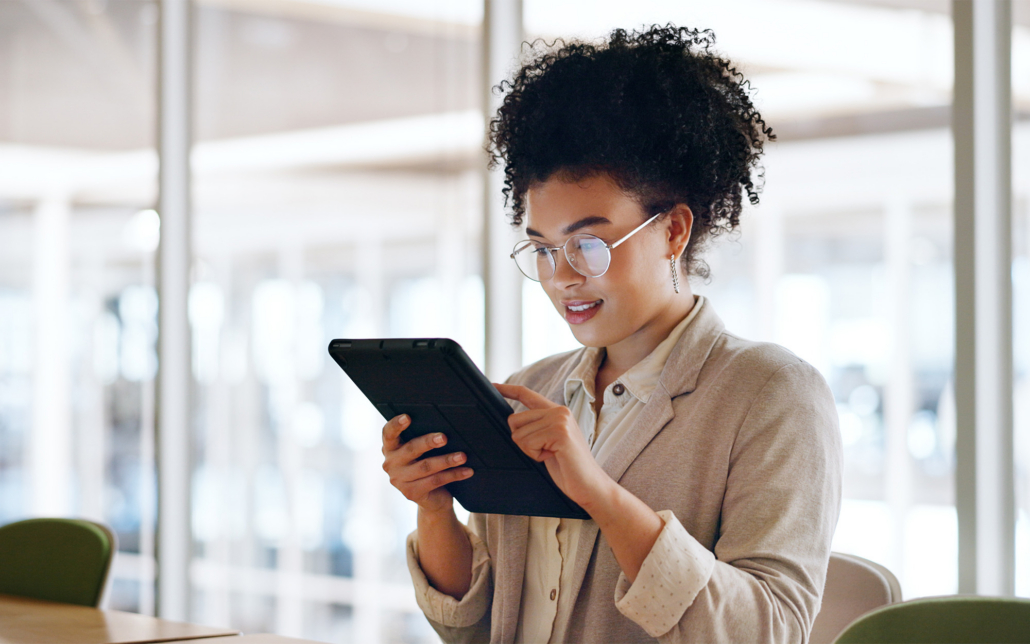 Worker On Tablet In Office