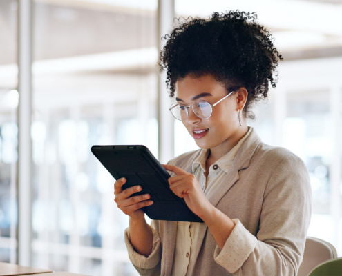 Worker On Tablet In Office